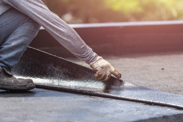 Professional Basement Waterproofing technician working in Moscow, PA